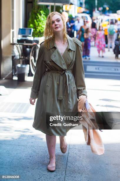 Elle Fanning is seen filming a Woody Allen film in the Upper East Side on September 25, 2017 in New York City.