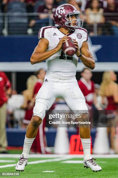 Texas A&M Aggies quarterback Kellen Mond looks for an open receiver downfield during the game between the Arkansas Razorbacks and the Texas A&M...