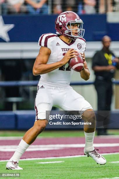 Texas A&M Aggies quarterback Kellen Mond looks for an open receiver downfield during the game between the Arkansas Razorbacks and the Texas A&M...