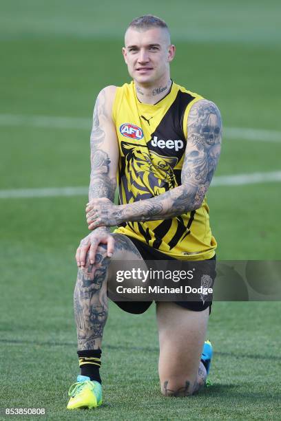 Dustin Martin, a winner of the Brownlow medal last night, looks on during the Richmond Tigers AFL training session at Punt Road Oval on September 26,...