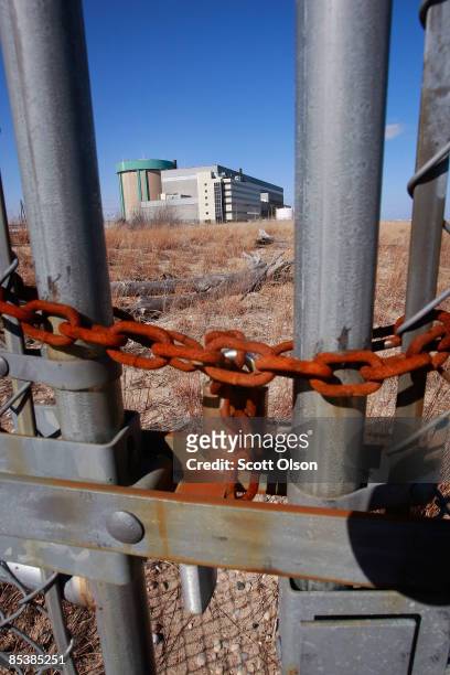 Rusted chain secures a gate to the shuttered Zion Nuclear Power Station along the shore of Lake Michigan March 11, 2009 in Zion, Illinois. About...