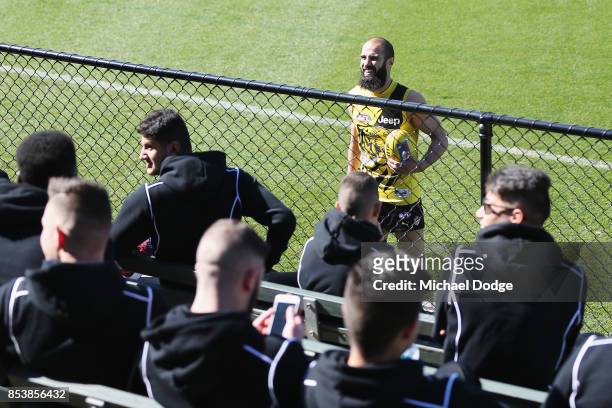 Bachar Houli of the Tigers speak to kids from his Bachar Houli Academy during a Richmond Tigers AFL training session at Punt Road Oval on September...