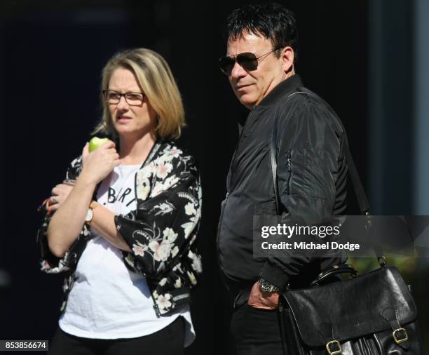 The manger of Dustin Martin, a winner of the Brownlow medal last night, Ralph Carr looks on with Tigers communications manager Nicki Malady during a...