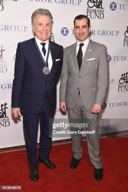 Event honoree, TV personality and victim rights activist John Walsh and son Callahan Walsh attend the 32nd Annual Great Sports Legends dinner at New...