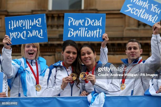 Team Scotland's Sarah Adlington, Kimberley Renicks, Louise Renicks and Euan Burton during the Commonwealth Games parade in Glasgow.