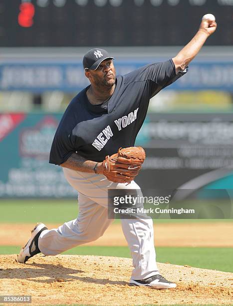 Sabathia of the New York Yankees pitches against the Detroit Tigers during the spring training game at Joker Marchant Stadium on March 11, 2009 in...