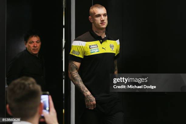 Dustin Martin, a winner of the Brownlow medal last night, arrives for his press conference with manager Ralph Carr behind ahead of the Richmond...