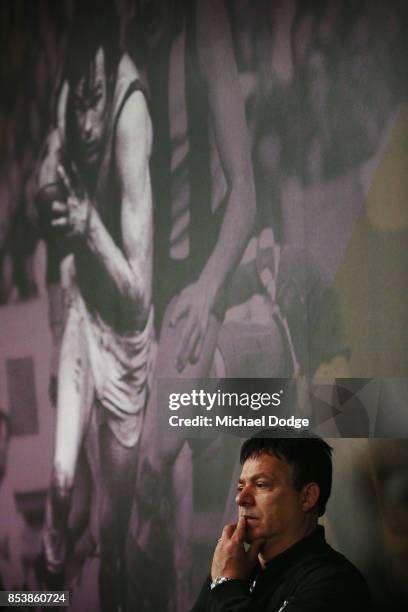 Dustin Martin, a winner of the Brownlow medal last night, speaks to media at his press conference as his manager Ralph Carr listens here ahead of the...