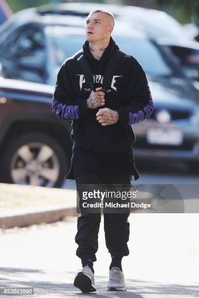 Dustin Martin, a winner of the Brownlow medal last night, arrives ahead of the Richmond Tigers AFL training session at Punt Road Oval on September...