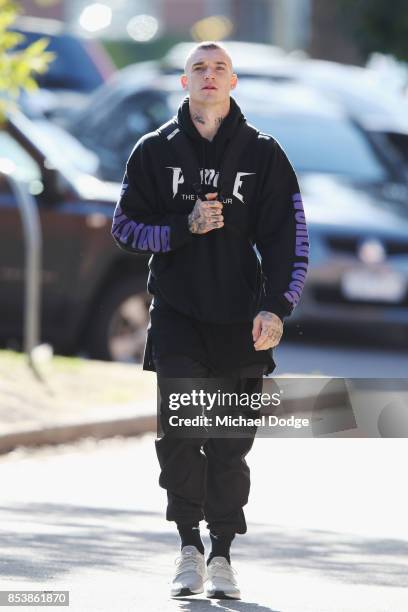 Dustin Martin, a winner of the Brownlow medal last night, arrives ahead of the Richmond Tigers AFL training session at Punt Road Oval on September...