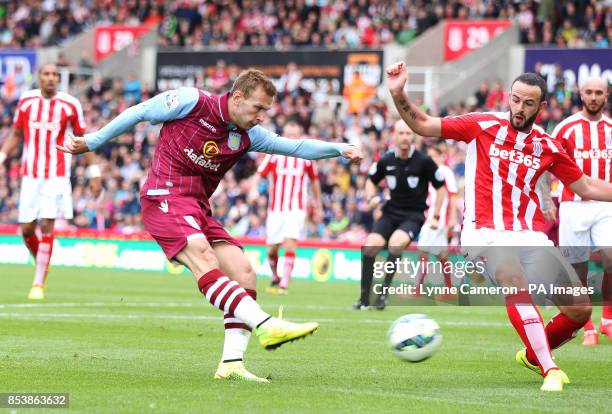 Aston Villa's Andreas Weimann scores hiss ides first goal of the game during the Barclays Premier League match at The Britannia Stadium, Stoke.