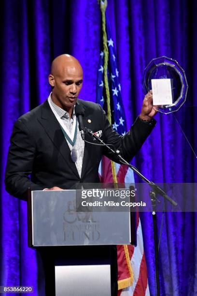 Honoree Jason Taylor speaks onstage at the 32nd Annual Great Sports Legends Dinner To Benefit The Miami Project/Buoniconti Fund To Cure Paralysis at...