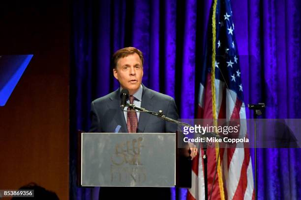 Master of Ceremonies Bob Costas speaks onstage during the 32nd Annual Great Sports Legends Dinner To Benefit The Miami Project/Buoniconti Fund To...