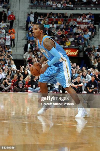 Smith of the Denver Nuggets drives the ball to the basket during the game against the Detroit Pistons on March 3, 2009 at The Palace of Auburn Hills...