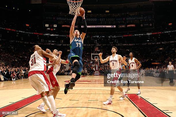 Mike Miller of the Minnesota Timberwolves goes to the basket against the Toronto Raptors during the game on February 24, 2009 at Air Canada Centre in...