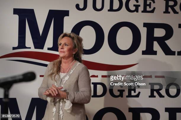Kayla Moore, the wife of Republican candidate for the U.S. Senate in Alabama Roy Moore, listens as her husband speaks at a campaign rally on...