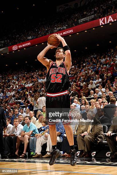 Brad Miller of the Chicago Bulls shoots against the Orlando Magic during the game at Amway Arena March 11, 2009 in Orlando, Florida. NOTE TO USER:...