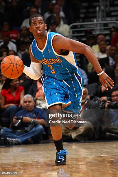 Chris Paul of the New Orleans Hornets drives against the Washington Wizards at the Verizon Center on March 11, 2009 in Washington, DC. NOTE TO USER:...