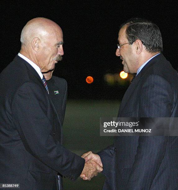 Iraqi Prime Minister Nuri al-Maliki is welcomed by Australian Minister for Defence Science and Personnel Warren Snowdon after his arrival to Canberra...