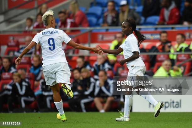 England's Lianne Sanderson and Eniola Aluko celebrate the opening goal during the FIFA Womens World Cup Qualifying Group Six match at Cardiff City...