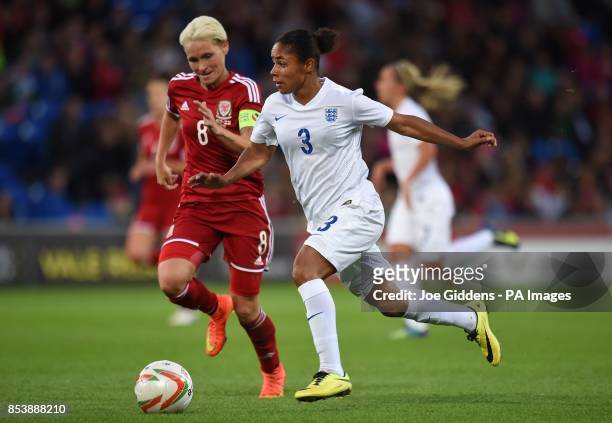 Wales' Jessica Fishlock and England's Demi Stokes battle for the ball during the FIFA Womens World Cup Qualifying Group Six match at Cardiff City...