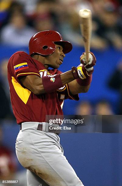Endy Chavez of Venezuela gets a hit during the 2009 World Baseball Classic Pool C match at the Rogers Centre March 11, 2009 in Toronto, Ontario,...