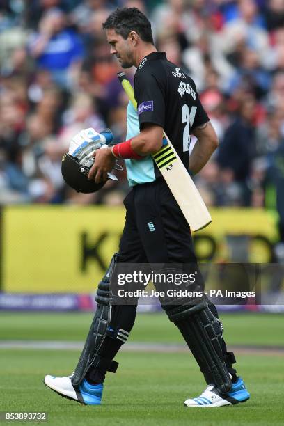 Surrey's Kevin Pietersen leaves the field dejected after being cauught and bowled by Birmingham Bears' Ateeq Javid during the NatWest T20 Blast Semi...
