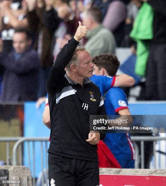 Inverness manager John Hughes gives thumbs up at the end during the Scottish Premiership match at Tulloch Caledonian Stadium, Inverness.