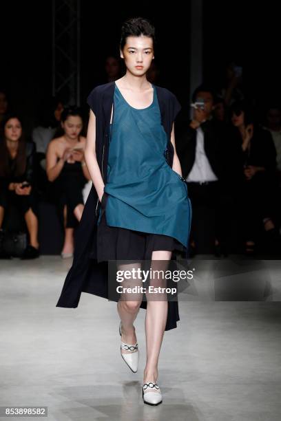 Model walks the runway at the Ujoh show during Milan Fashion Week Spring/Summer 2018 on September 25, 2017 in Milan, Italy.