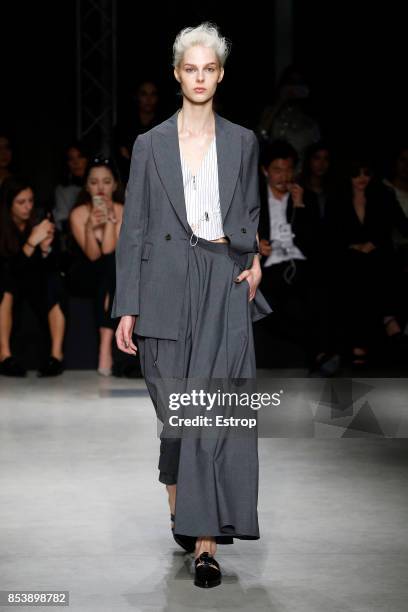 Model walks the runway at the Ujoh show during Milan Fashion Week Spring/Summer 2018 on September 25, 2017 in Milan, Italy.