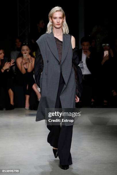 Model walks the runway at the Ujoh show during Milan Fashion Week Spring/Summer 2018 on September 25, 2017 in Milan, Italy.