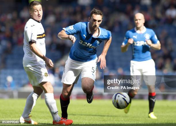 Rangers' Lee Wallace and Dumbarton's Mark Gilhaney during the Scottish Championship match at Ibrox Stadium, Glasgow.