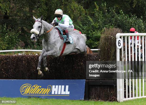 Balbriggan ridden by Richard Johnson on their way to victory in the Miller Howe Cavendish Cup at Cartmel Racecourse, Cartmel, Cumbria.
