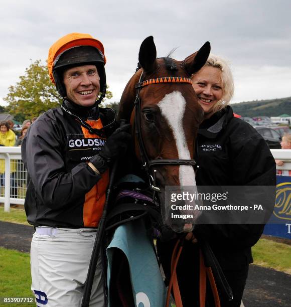 Teak and Richard Johnson after their victory in the William Hill 80th Anniversary Handicap Hurdle at Cartmel Racecourse, Cartmel, Cumbria.