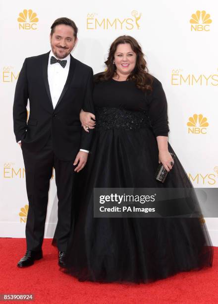 Melissa McCarthy and Ben Falcone arriving at the EMMY Awards 2014 at the Nokia Theatre in Los Angeles, USA.