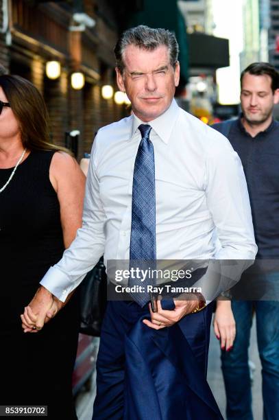Actor Pierce Brosnan enters the "The Late Show With Stephen Colbert" taping at the Ed Sullivan Theater on September 25, 2017 in New York City.
