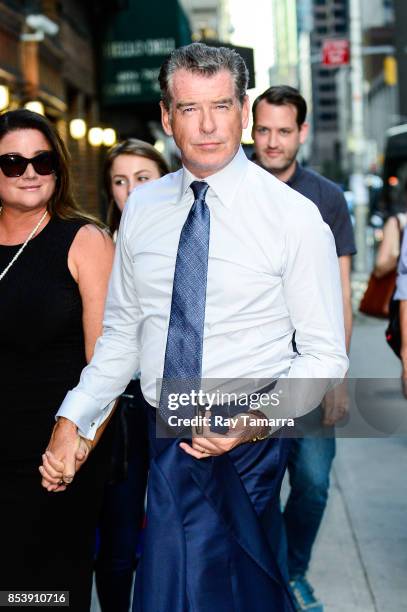 Actor Pierce Brosnan enters the "The Late Show With Stephen Colbert" taping at the Ed Sullivan Theater on September 25, 2017 in New York City.
