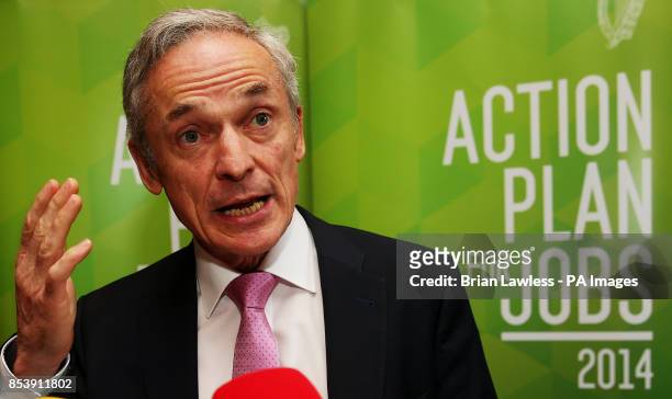 Minister for Jobs, Enterprise and Innovation, Richard Bruton at a press conference at his Department in Dublin, to discuss the latest CSO official...