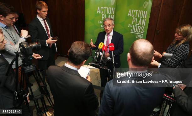 Minister for Jobs, Enterprise and Innovation, Richard Bruton at a press conference at his Department in Dublin, to discuss the latest CSO official...