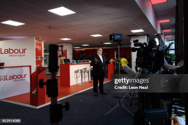 Deputy Leader of the Labour Party Tom Watson is interviewed by a TV crew on the third day of the Labour Party conference on September 26, 2017 in...