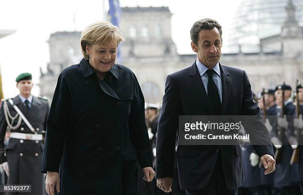 German Chancellor Angela Merkel welcomes French President Nicolas Sarkozy at the chancellery on March 12, 2009 in Berlin, Germany. The two leaders...