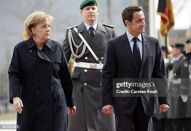 German Chancellor Angela Merkel welcomes French President Nicolas Sarkozy at the chancellery on March 12, 2009 in Berlin, Germany. The two leaders...