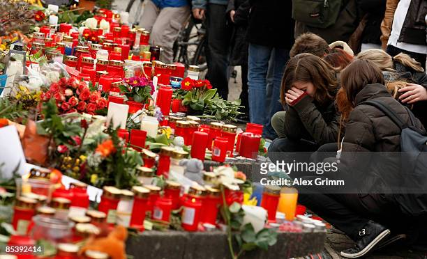 Pupils mourn in front of the Albertville-School Centre on March 12, 2009 in Winnenden near Stuttgart, Germany. 17 - year old Tim Kretschmer, opened...