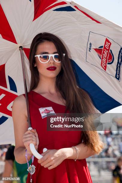 Umbrella gird during of race day of the Gran Premio Movistar de Aragon, Circuit of Motorland, Alcañiz, Spain. Sunday, 24th september, 2017.