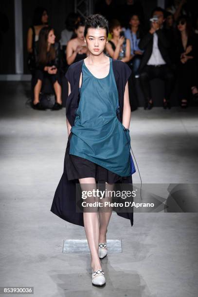 Model walks the runway at the Ujoh show during Milan Fashion Week Spring/Summer 2018 on September 25, 2017 in Milan, Italy.