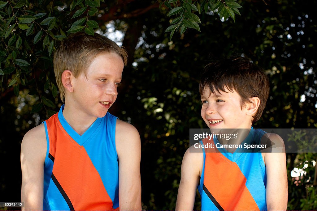 Two young players talking