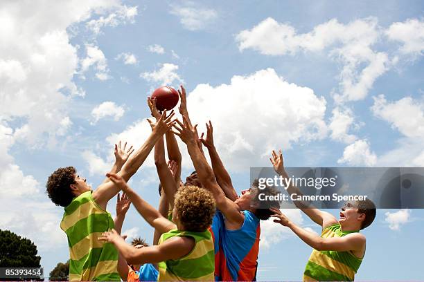 players all competing for australian football - afl footy stock pictures, royalty-free photos & images