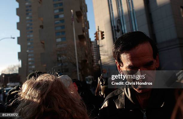 Investment victim Richard Friedman of Jericho, New York waits outside a Manhattan Federal court after financier Bernard Madoff entered to give an...