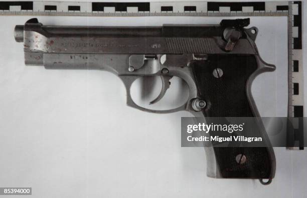 The Beretta 9mm gun used by Tim Kretschmer is pictured during a press conference at the police station on March 12, 2009 in Waiblingen, Germany. 17 -...