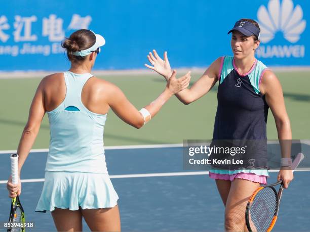 Andreja Klepac of Slovenia and Maria Jose Martinez Sanchez of Spain celebrates after winning the match against Chia-Jung Chuang of Taipei and Chen...